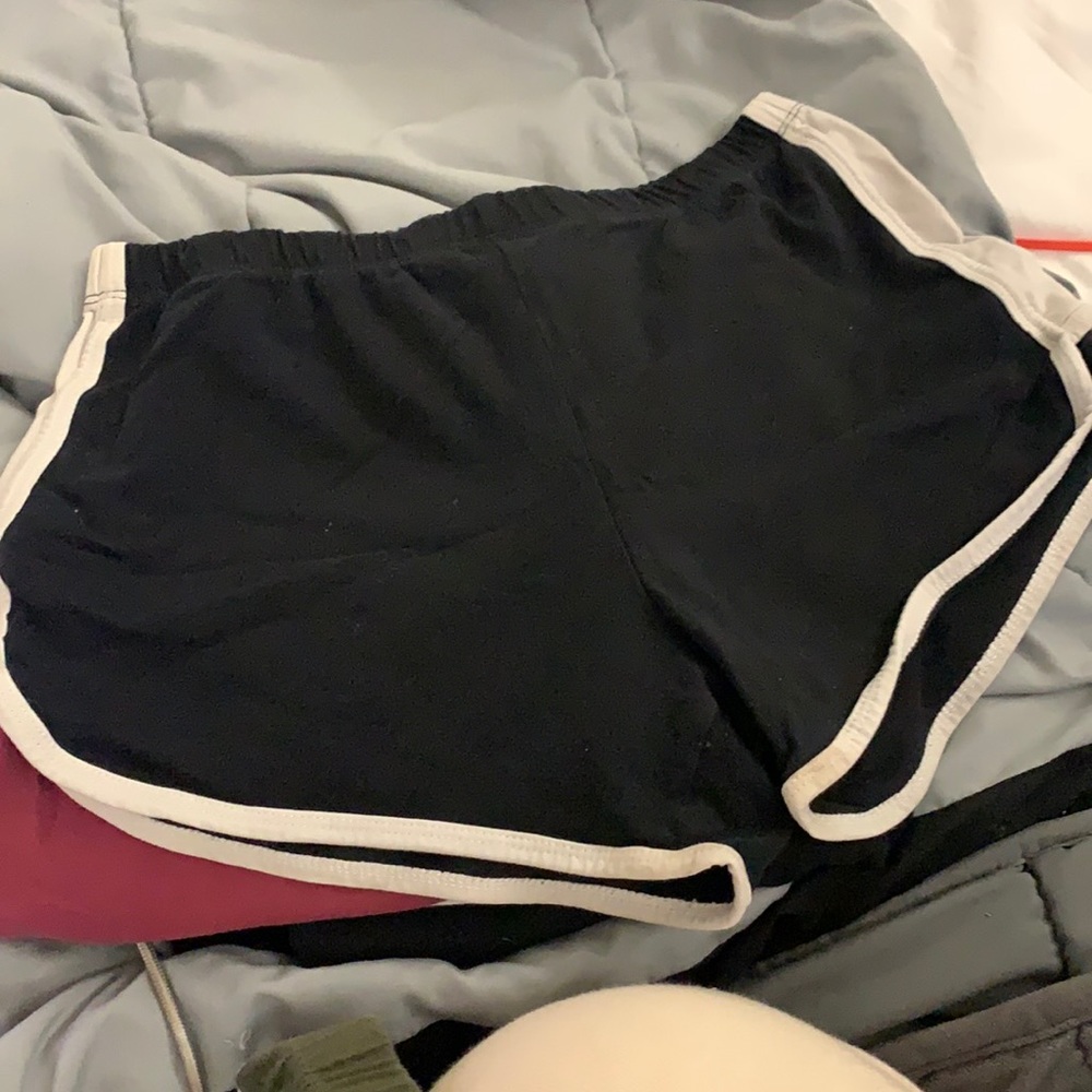 2 PAIRS OF DOLPHIN SHORTS